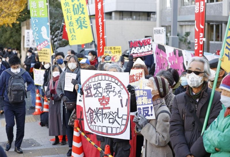 People protest against a tax hike plan for higher defense spending in front of the prime minister's office in Tokyo, Japan December 16, 2022, in this photo by taken by Kyodo via REUTERS/File Photo