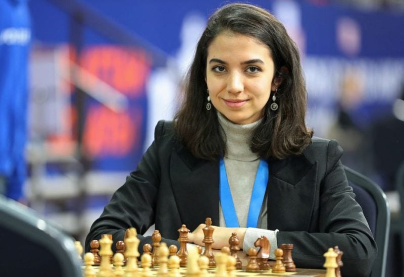 Chess - FIDE World Rapid and Blitz Championships - Rapid Women - Almaty, Kazakhstan - December 28, 2022. Sara Khadem of Iran sits in front of a chess board. REUTERS/Pavel Mikheyev