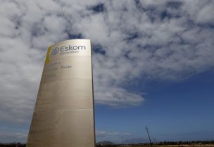 The logo of state power utility Eskom is seen outside Cape Town's Koeberg nuclear power plant. REUTERS/Mike Hutchings