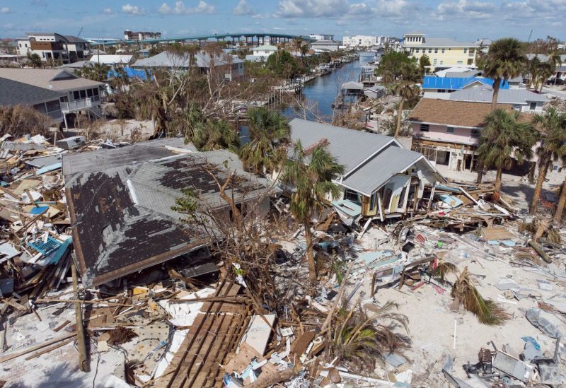 Remains of destroyed houses are seen almost one month after Hurricane Ian landfall, in Fort Myers Beach, Florida, U.S., October 26, 2022. REUTERS/Marco Bello