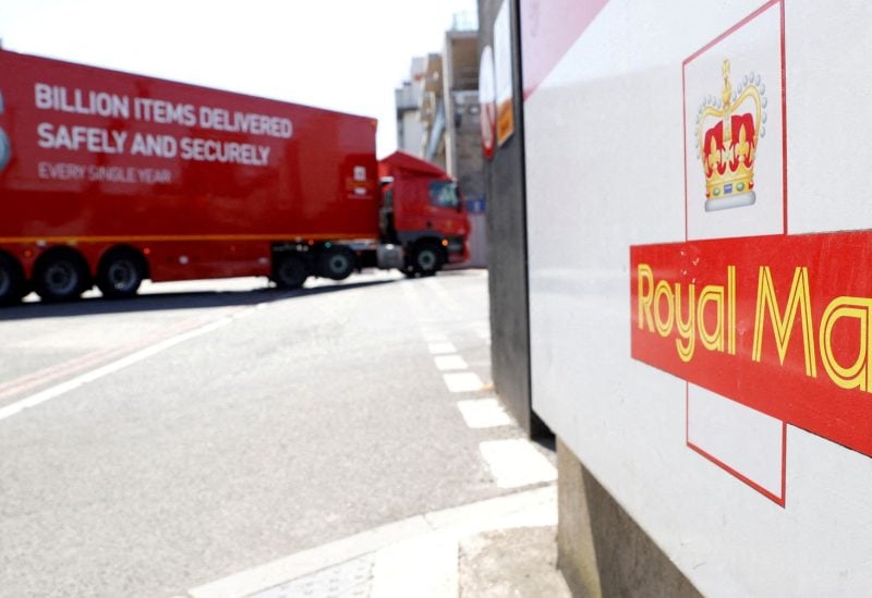 The logo of Royal Mail is seen outside the Mount Pleasant Sorting Office as a delivery vehicle arrives, in London, Britain, June 25, 2020. REUTERS/John Sibley
