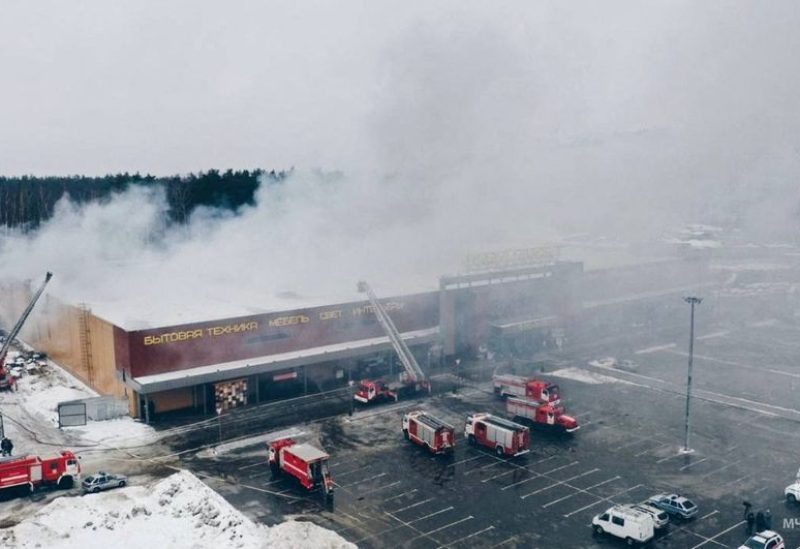 Firefighters work to extinguish a fire at a construction supplies hypermarket in the town of Balashikha outside Moscow, Russia December 12, 2022 - REUTERS