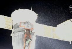 A stream of particles, which NASA says appears to be liquid and possibly coolant, sprays out of the Soyuz spacecraft on the International Space Station NASA TV/Handout via REUTERS