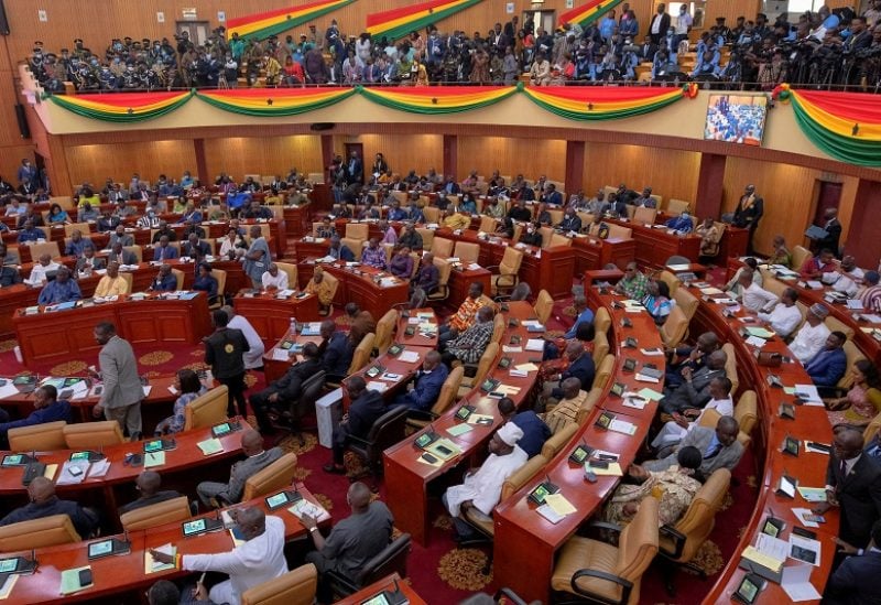 FILE PHOTO: Parliamentarians and members of the public listen as Ghanaian President Nana Akufo-Addo delivers his annual state of the nation address to the parliament in Accra, Ghana, March 30, 2022. REUTERS/Francis Kokoroko/File Photo