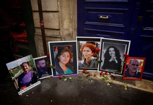 Portraits of six victims who were killed in attacks in 2013 and 2022 are seen as members of the Kurdish community hold a march organised by the Kurdish Democratic Council in France (CDK-F) in tribute to the victims of Friday's deadly attack, in Paris, France, December 26, 2022. REUTERS/Sarah Meyssonnier