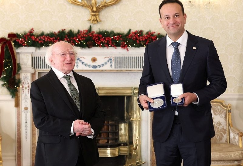 The President of Ireland Michael D.Higgins presents Leo Varadkar the seal of office after he becomes the Republic of Ireland's new Prime Minister (Taoiseach) in Dublin, Ireland December 17, 2022. REUTERS/Damien Eagers