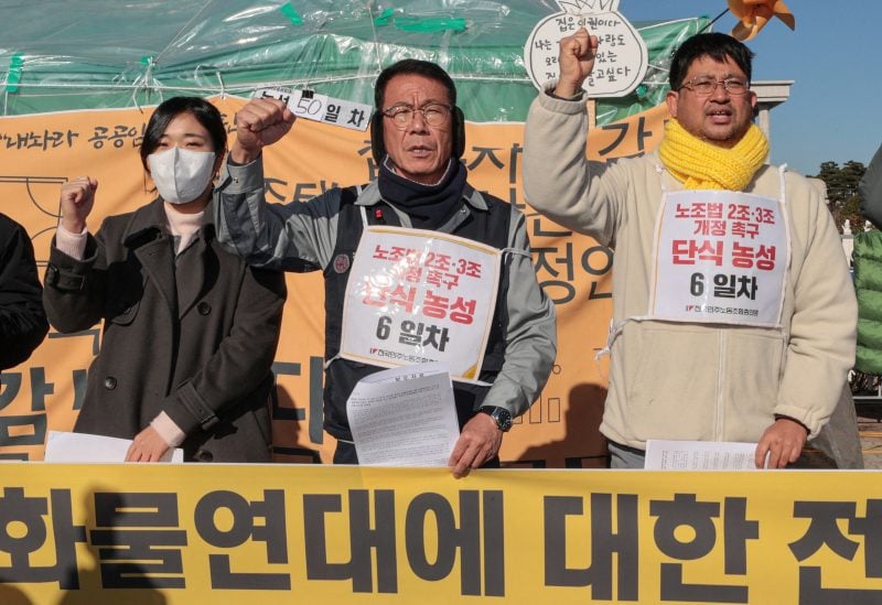 Protesters chant slogans at a news conference in support of the ongoing strike by truckers in Seoul, South Korea December 5, 2022. Yonhap via REUTERS