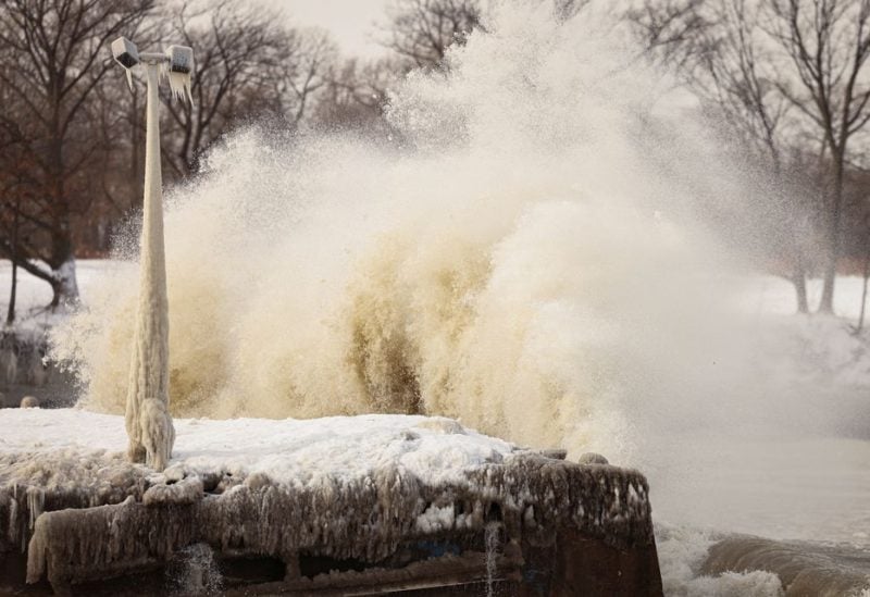 Ice forms by the spray of Lake Erie waves during a winter storm in Silver Creek, New York, U.S., December 24, 2022. REUTERS