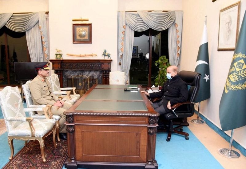 Lieutenant General Asim Munir, who was appointed as the new Chief Of Army Staff (COAS) of Pakistan, meets with Pakistan's Prime Minister Shehbaz Sharif at the Prime Minister's House, in Islamabad, Pakistan November 24, 2022 - REUTERS