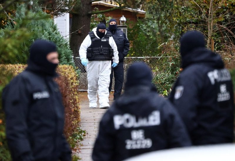 Police secures the area after 25 suspected members and supporters of a far-right group were detained during raids across Germany, in Berlin, Germany December 7, 2022. REUTERS/Christian Mang