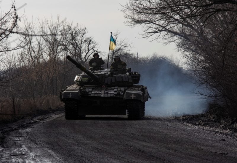 Ukrainian servicemen ride atop a tank near the frontline town of Bakhmut, amid Russia's attack on Ukraine, in Donetsk region, Ukraine January 20, 2023. REUTERS/Oleksandr Ratushniak