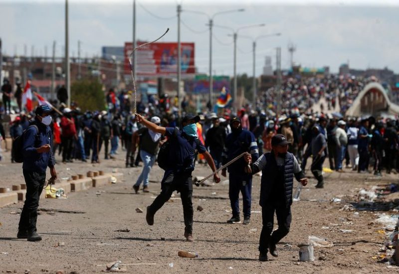 Demonstrators clash with security forces during a protest demanding early elections and the release of jailed former President Pedro Castillo, near the Juliaca airport, in Juliaca, Peru January 9, 2023. REUTERS/Hugo Courotto NO RESALES. NO ARCHIVES