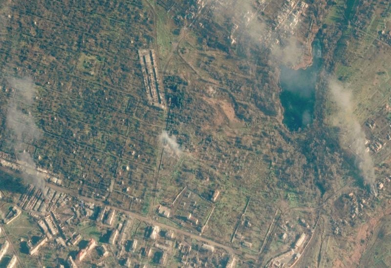 A satellite view shows a smoldering building, in Soledar, Ukraine, January 3, 2023. Satellite image 2023 Maxar Technologies./Handout via REUTERS