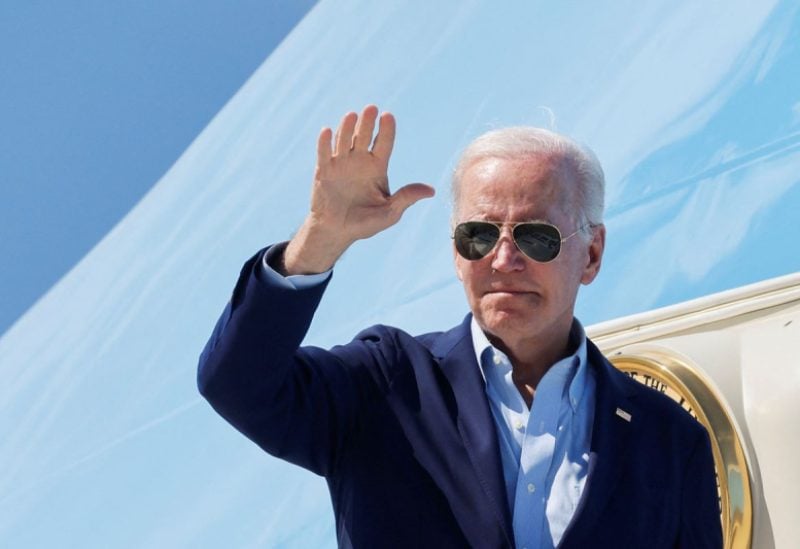 U.S. President Joe Biden gestures as he boards Air Force One at Rohlsen Airport to depart after a New Year holiday visit to Christiansted, St. Croix, U.S. Virgin Islands, U.S. January 2, 2023. REUTERS/Jonathan Ernst