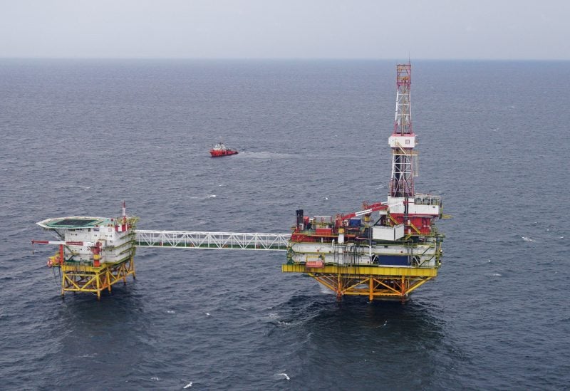 An oil platform operated by Lukoil company is pictured from a helicopter carrying members of a local election committee and journalists during the early voting for the parliamentary election, at the Kravtsovskoye oilfield in the Baltic Sea, Russia September 16, 2021. REUTERS/Vitaly Nevar