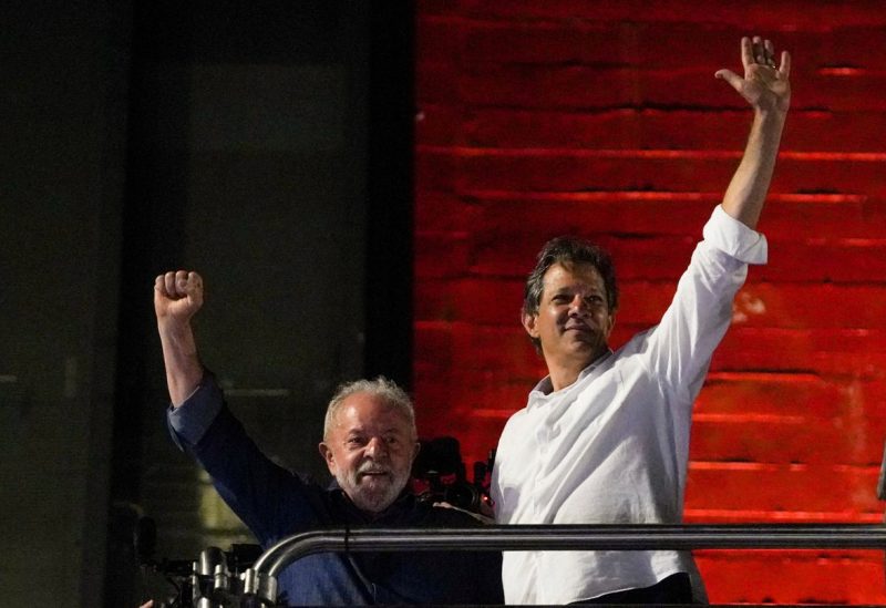 Brazil's former President and presidential candidate Luiz Inacio Lula da Silva and Sao Paulo Governor candidate Fernando Haddad react at an election night gathering on the day of the Brazilian presidential election run-off, in Sao Paulo, Brazil, October 30, 2022. REUTERS/Mariana Greif/File Photo