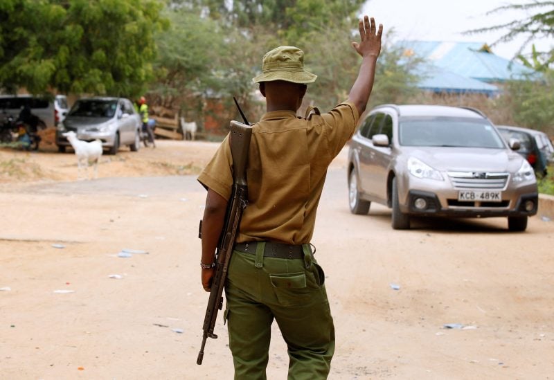 A police officer stops a car at the entrance of the Garissa University College in Kenya's northeast town of Garissa, January 11, 2016. The campus reopened nine months after an attack by Somalia-based al-Qaeda linked al-Shabaab Islamist militants. REUTERS/Thomas Mukoya/File Photo
