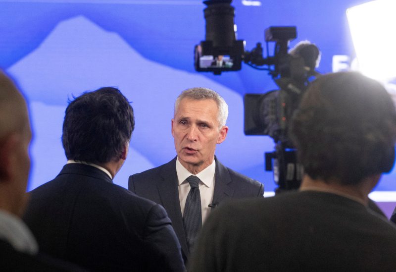 NATO Secretary General Jens Stoltenberg attends an TV interview in a hall at Davos Congress Centre, the venue of the World Economic Forum (WEF) 2023, in the Alpine resort of Davos, Switzerland, January 18, 2023. REUTERS/Arnd Wiegmann