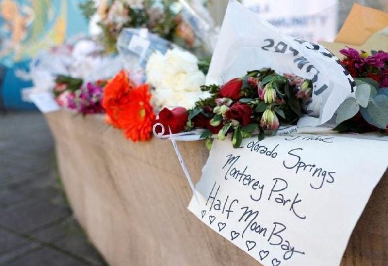 Notes and flowers lie at a memorial for shooting victims at Mac Dutra Park in Half Moon Bay, California, U.S., January 25, 2023. REUTERS/Fred Greaves