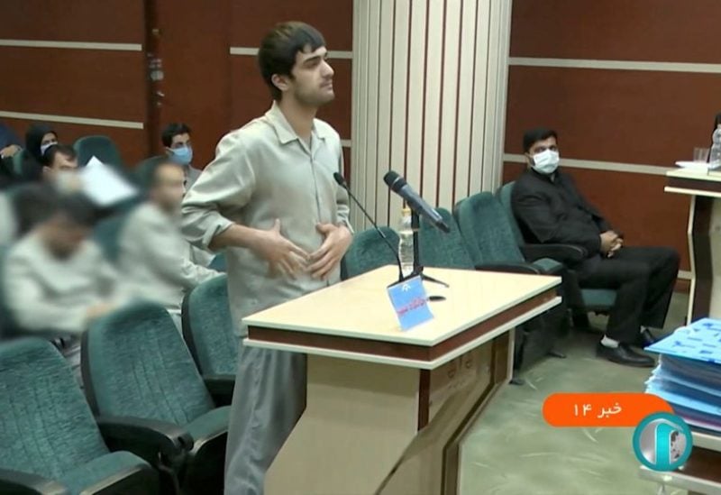 Mohammad-Mehdi Karami speaks in a courtroom before being executed by hanging, along with Seyyed Mohammad Hosseini, for allegedly killing a member of the security forces. Tehran, January 7, 2023. West Asia News Agency)/Handout via REUTERS