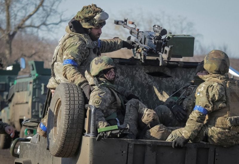 Wounded Ukrainian servicemen are seen during an evacuation, amid Russia's attack on Ukraine, near Bakhmut in Donetsk region, Ukraine January 23, 2023. REUTERS