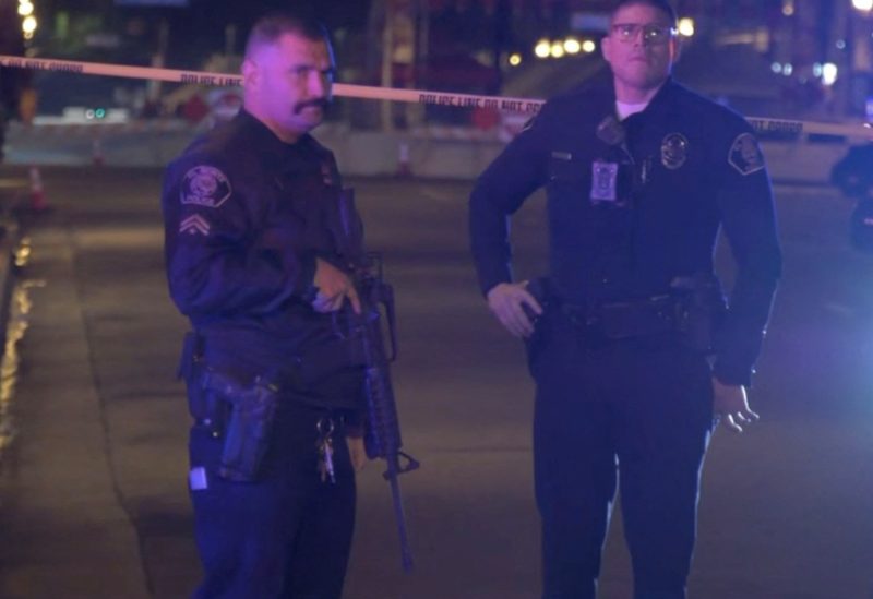 Screenshot from a viodeo shows police officers standing guard at the scene of a shooting at Monterey Park, California, U.S. January 22, 2023. TNLA/Handout via REUTERS