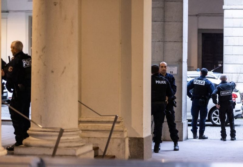 Police officers stand outside the room of the court of appeals after the arriving of the billionaire Kostyantyn Zhevago, in Chambery, France, January 5, 2023. REUTERS/Pierre Albouy