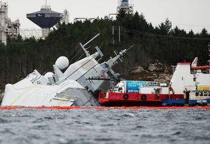 The Norwegian frigate "KNM Helge Ingstad" takes on water after a collision with the tanker "Sola TS" in Oygarden, Norway, November 10, 2018. NTB Scanpix/Marit Hommedal via REUTERS