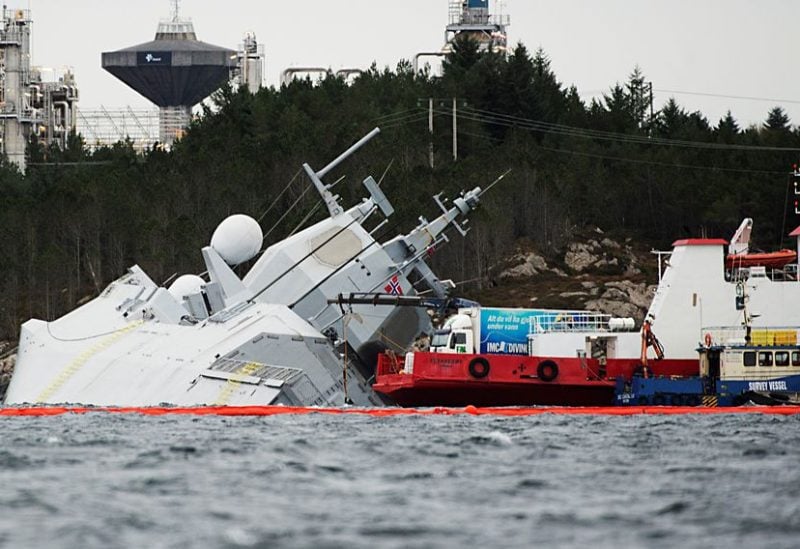The Norwegian frigate "KNM Helge Ingstad" takes on water after a collision with the tanker "Sola TS" in Oygarden, Norway, November 10, 2018. NTB Scanpix/Marit Hommedal via REUTERS