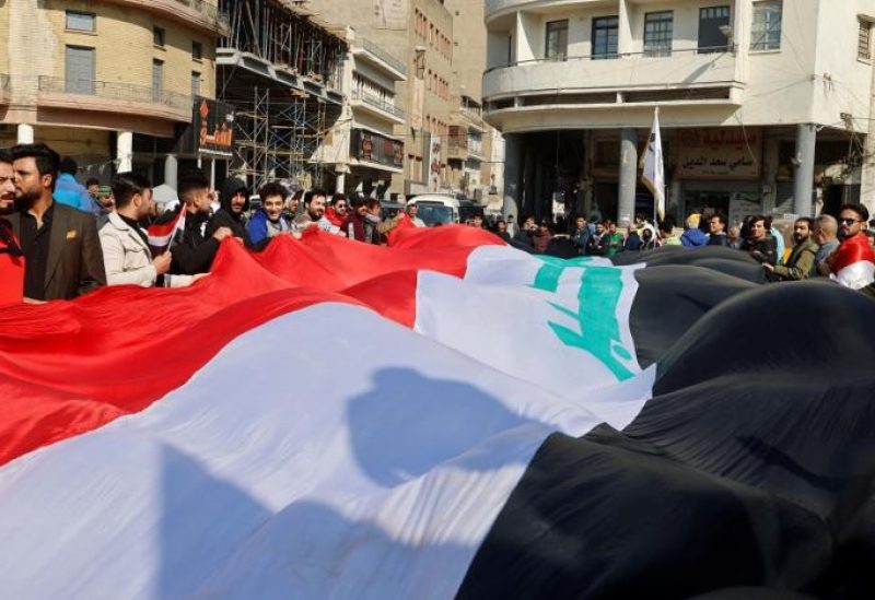 Iraqi protesters demonstrate against the dinar's slide in value against the US dollar, near the central bank in Baghdad, Iraq January 25, 2023