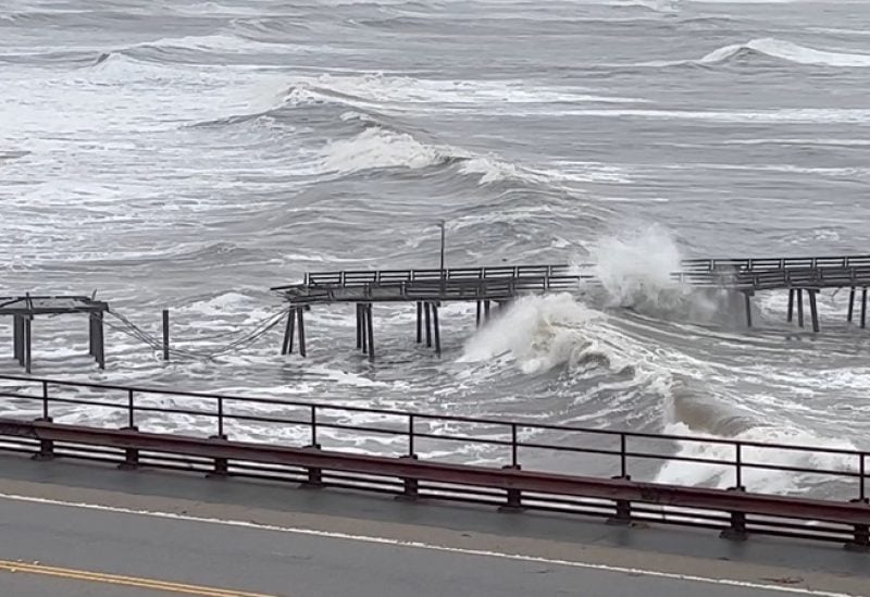 Capitola Wharf damaged by heavy storm waves is seen in Santa Cruz, California, U.S., January 5, 2023, in this screen grab obtained from a social media video. Kelly Pound/via REUTERS THIS IMAGE HAS BEEN SUPPLIED BY A THIRD PARTY. MANDATORY CREDIT. NO RESALES. NO ARCHIVES.