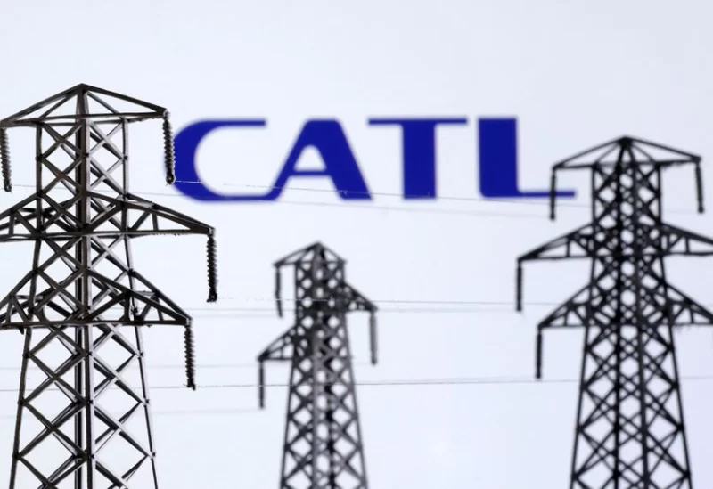 Electric power transmission pylon miniatures and CATL logo are seen in this illustration taken, December 9, 2022. REUTERS