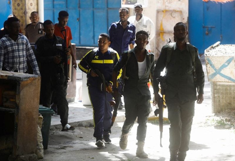 Somali policemen prepare to take their positions near the mayor's office following a blast in Mogadishu, Somalia January 22, 2023. REUTERS