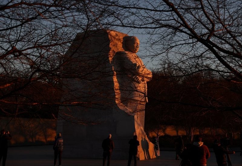 People gather at the Martin Luther King, Jr. Memorial in Washington, U.S., January 16, 2023. REUTERS/Julia Nikhinson