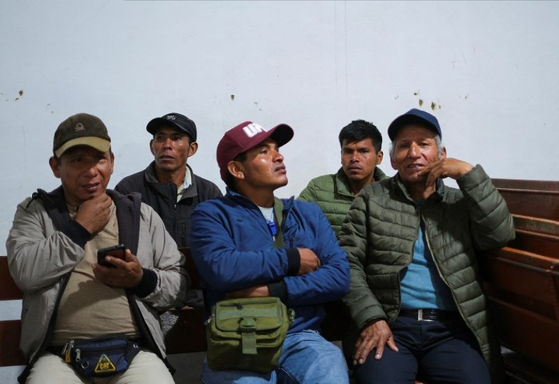 People rest before heading to Lima to gather with protesters from around the country for the 'Capture of Lima' march, calling for the resignation of Peru's President Dina Boluarte, following the ousting and arrest of former President Pedro Castillo, in Cusco, Peru, January 18, 2023. REUTERS/Paul Gambin NO RESALES. NO ARCHIVES