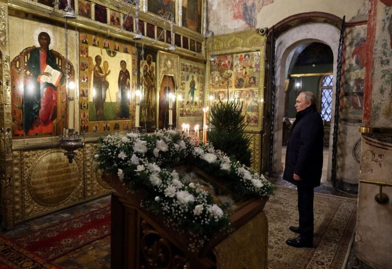 Russian President Vladimir Putin attends the Orthodox Christmas service at the Kremlin in Moscow, Russia January 7, 2023. Sputnik/Mikhail Klimentyev/Kremlin via REUTERS