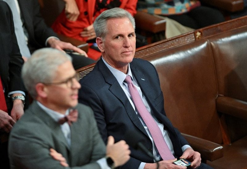 U.S. House Republican Leader Kevin McCarthy (R-CA) looks over at Rep. Patrick McHenry (R-NC) shortly after things became physical between Republican representatives on the floor of the House as the House of Representatives holds a late night 14th round of voting for a new House Speaker on the fourth day of the 118th Congress at the U.S. Capitol in Washington, U.S., January 6, 2023. REUTERS/Jon Cherry