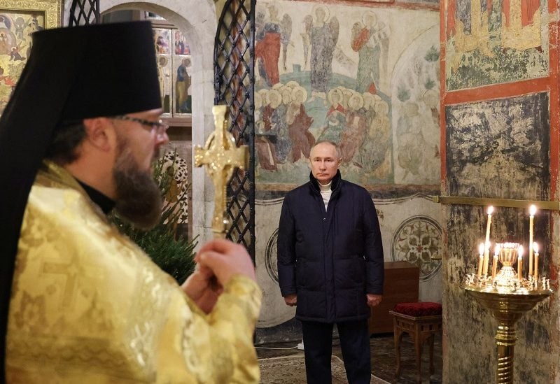 Russian President Vladimir Putin attends the Orthodox Christmas service at the Kremlin in Moscow, Russia January 7, 2023. Sputnik/Mikhail Klimentyev/Kremlin via REUTERS ATTENTION EDITORS - THIS IMAGE WAS PROVIDED BY A THIRD PARTY.