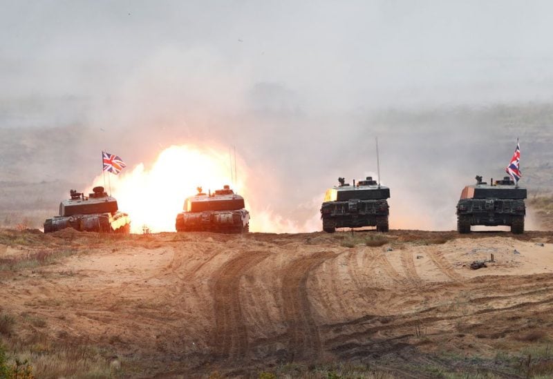 British Army Challenger 2 tank fires during NATO enhanced Forward Presence battle group Iron Spear 2019 exercise in Adazi, Latvia October 11, 2019. REUTERS