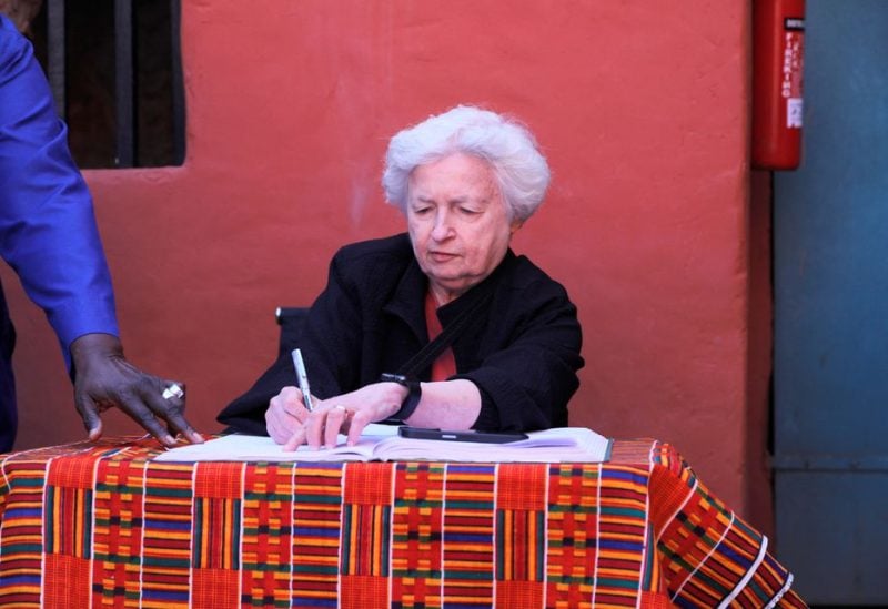 U.S. Treasury Secretary Janet Yellen signs the visitor book after she visited the House of Slaves at Goree Island off the coast of Dakar, Senegal January 21, 2023 - REUTERS
