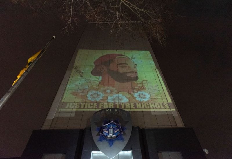 An image is projected onto the facade of the Oakland Police Department during a protest against the fatal beating of Black motorist Tyre Nichols by Memphis Police officers, during a rally in Oakland, California, U.S. January 29, 2023 - REUTERS