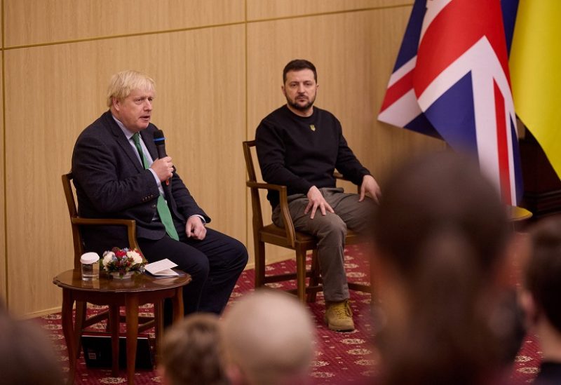 Former British Prime Minister Boris Johnson and Ukraine's President Volodymyr Zelenskiy address students of the State Taras Shevchenko University, amid Russia's attack on Ukraine, in Kyiv, Ukraine January 22, 2023. Ukrainian Presidential Press Service/Handout via REUTERS ATTENTION EDITORS - THIS IMAGE HAS BEEN SUPPLIED BY A THIRD PARTY.