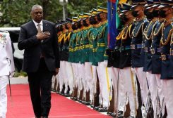 U.S. Defense Secretary Lloyd Austin III walks past military guards during arrival honors at the Department of National Defense in Camp Aguinaldo military camp in Quezon City, Metro Manila, Philippines, February 2, 2023. Rolex dela Pena/Pool via REUTERS