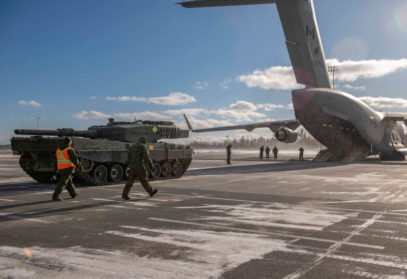 A Leopard 2A4 tank is loaded onto a Royal Canadian Armed Forces (RCAF) CC-177 Globemaster III to be sent overseas as part of Canada's aid to Ukraine in Halifax, Nova Scotia, Canada February 3, 2023. Canadian Forces/Corporal Amelie Graveline/Handout via REUTERS