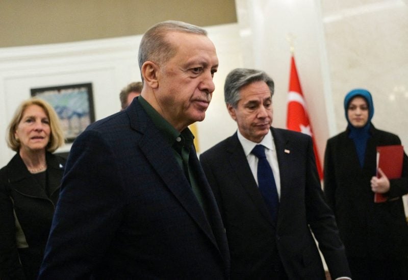 Turkish President Recep Tayyip Erdogan, talks to U.S. Secretary of State Antony Blinken during their meeting at Esenboga airport in Ankara, Turkey, Monday, February 20, 2023. Burhan Ozbilici/Pool via REUTERS/File Photo