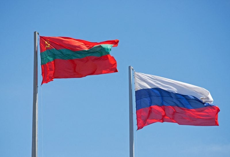 Flags of Moldova's breakaway region of Transdniestria and Russia flutter in central Tiraspol, in Moldova's breakaway region of Transdniestria May 5, 2022. REUTERS/Vladislav Bachev