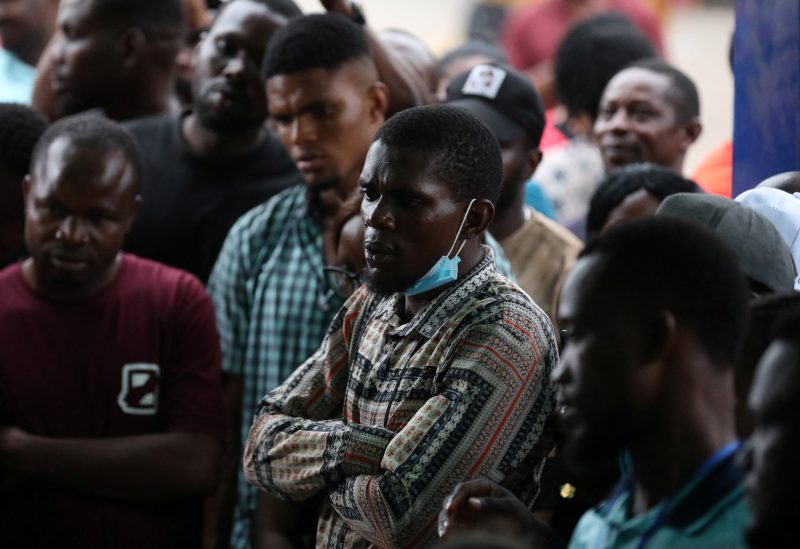 People wait for results during the counting process of Nigeria's presidential election, at a polling unit in Awka, Anambra state, Nigeria February 25, 2023. REUTERS/Temilade Adelaja