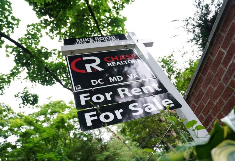 A "For Rent, For Sale" sign is seen outside of a home in Washington, U.S., July 7, 2022. REUTERS
