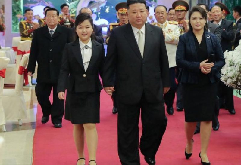 08 February 2023, North Korea: A picture provided by North Korea's state news agency KCNA on 08 February 2023, shows North Korean leader Kim Jong Un, walking with his wife Ri Sol Ju and daughter during a banquet at an undisclosed location to mark the 75th anniversary of the founding of the Korean People's Army. (KCNA/KNS/dpa)