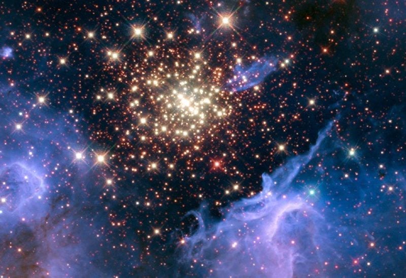 FILE PHOTO: A cluster of young stars resembles an aerial burst, surrounded by clouds of interstellar gas and dust, in a nebula NGC 3603 located in the constellation Carina, in this image captured in August 2009 and December 2009, and obtained September 26, 2018. NASA/ESA/R. O'Connell/F. Paresce/E. Young/Ames Research Center/WFC3 Science Oversight Committee/Hubble Heritage Team/STScI/AURA/Handout via REUTERS THIS IMAGE HAS BEEN SUPPLIED BY A THIRD PARTY. IT IS DISTRIBUTED, EXACTLY AS RECEIVED BY REUTERS, AS A SERVICE TO CLIENTS/File Photo